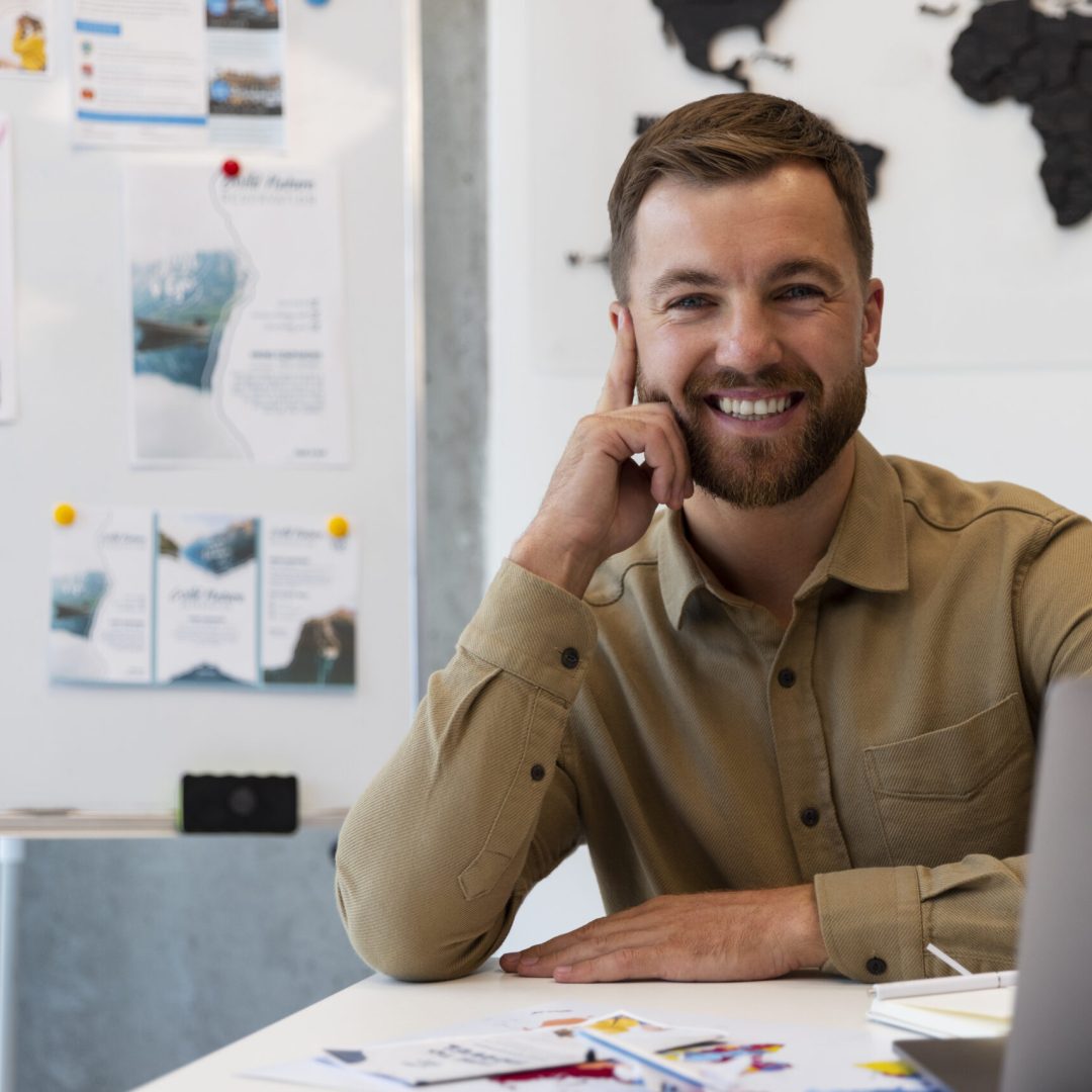 front-view-man-working-travel-agency front-view-man-working-travel-agency
