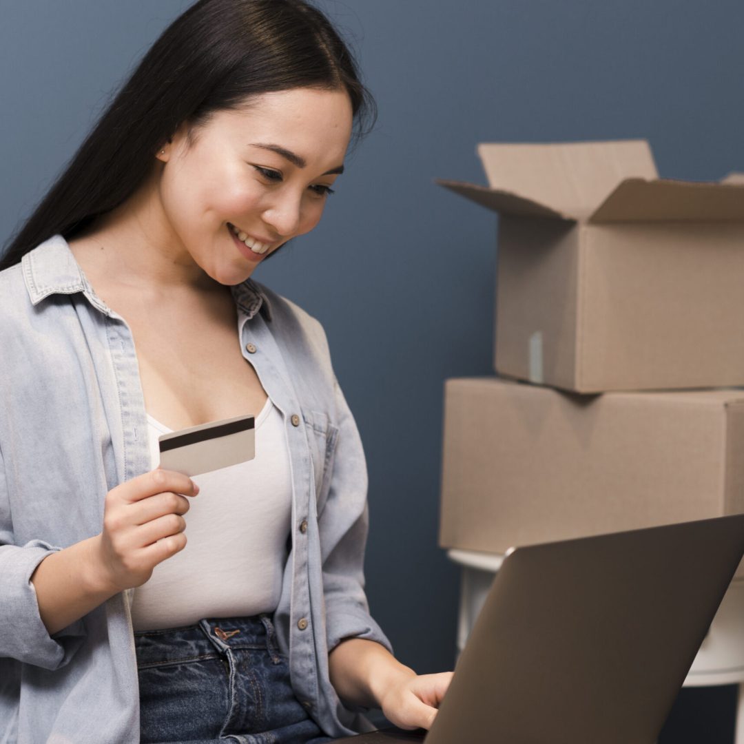 side-view-smiley-woman-doing-some-online-purchasing