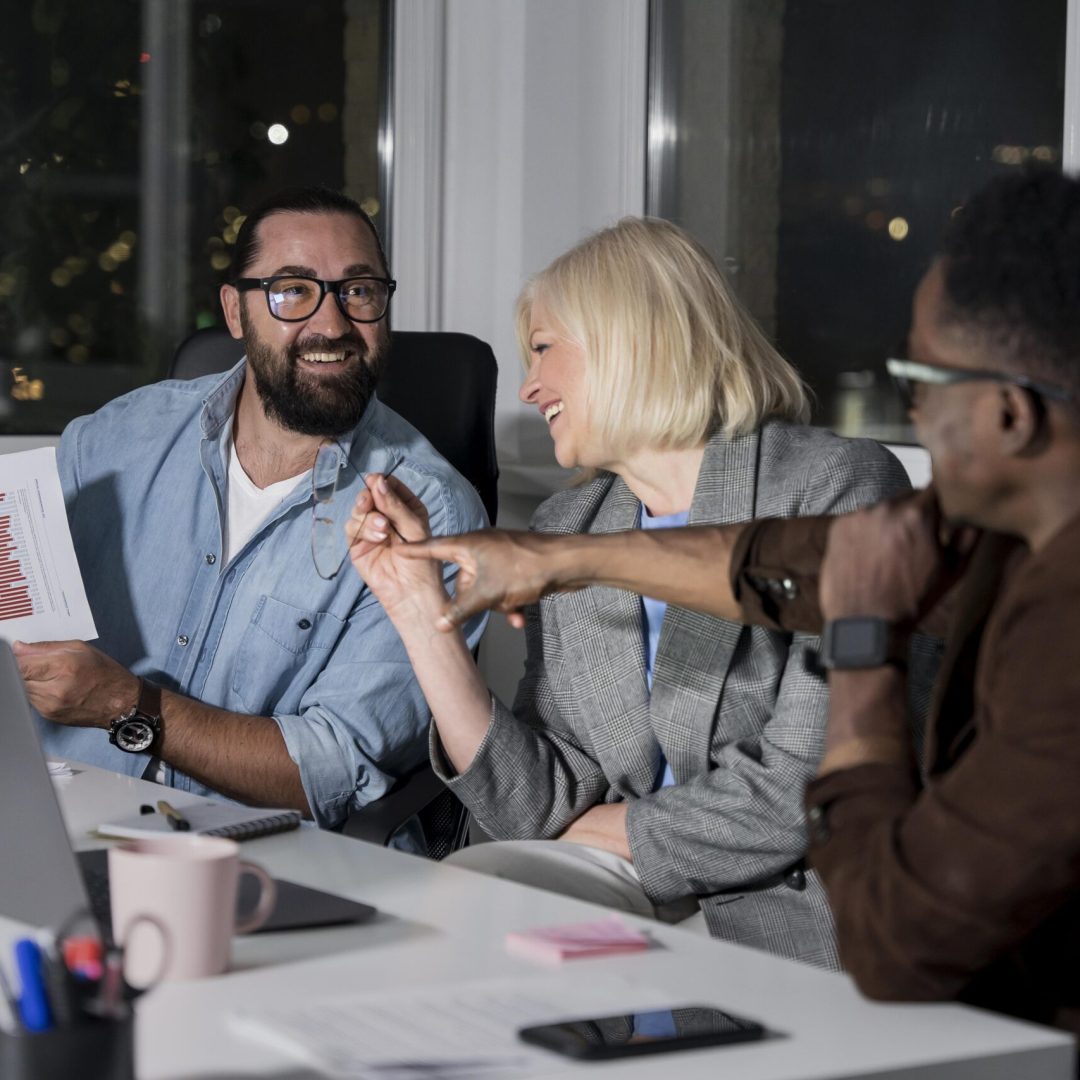 teammates-working-late-office